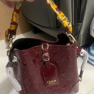 Coach Burgundy Embossed Leather Bag
